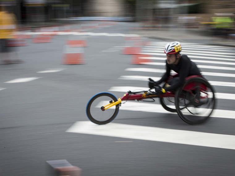 Athletes racing in the GIO Oz Day 10k Wheelchair Race in The Rocks on Australia Day 2018