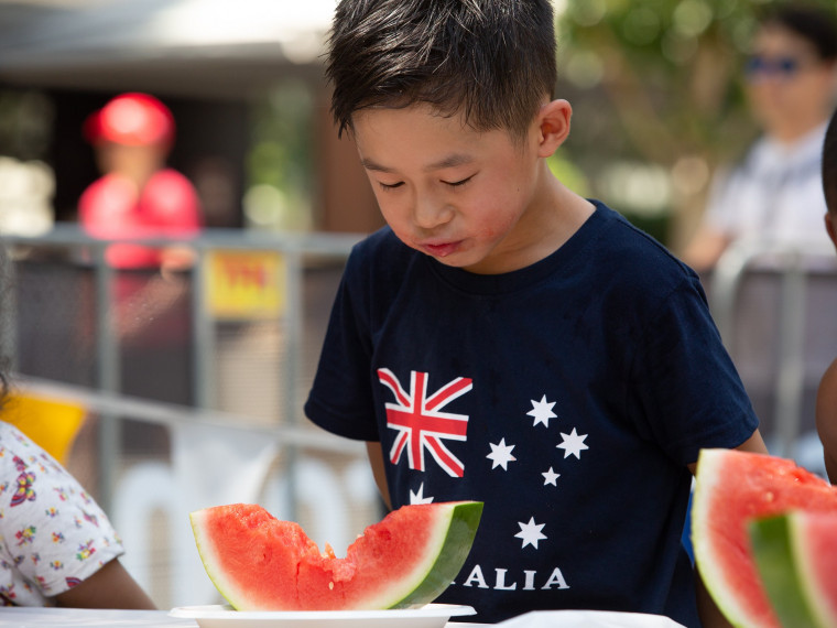 Competitor in the watermelon eating competition
