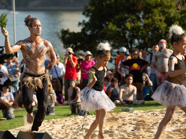 Male dancer and two young female dancers the Wugulora Morning Ceremony