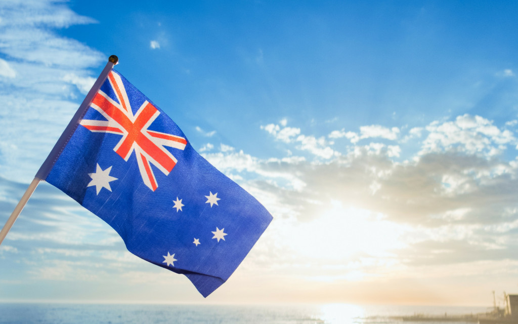 An Australian flag flying on a sunny day