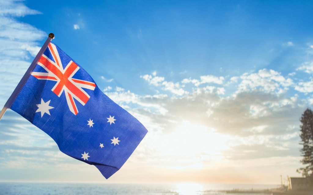 An Australian flag flying on a sunny day